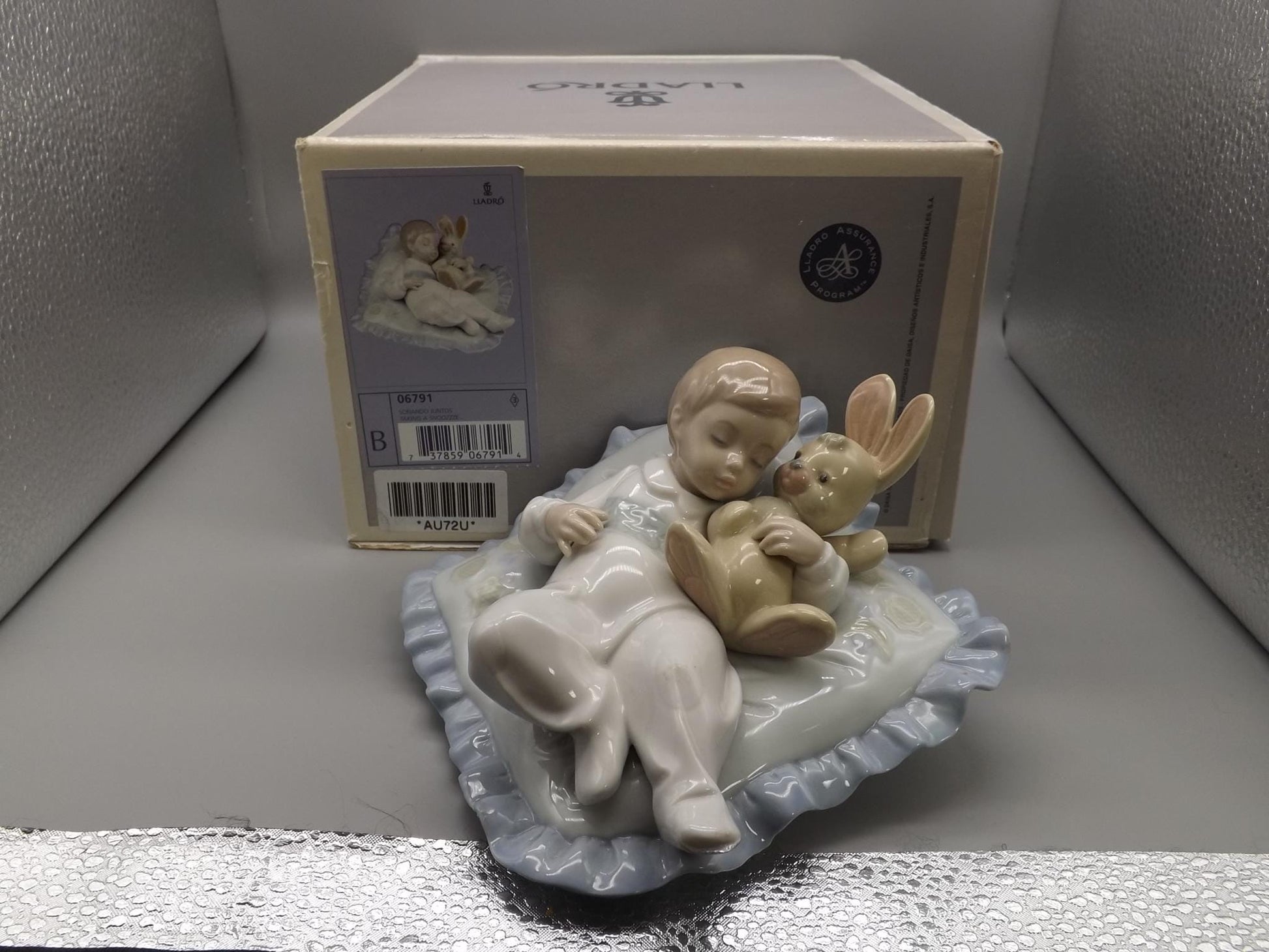 Vintage Lladro "Taking A Snooze" Baby sleeping on a pillow, #6791 (2001, with Box)