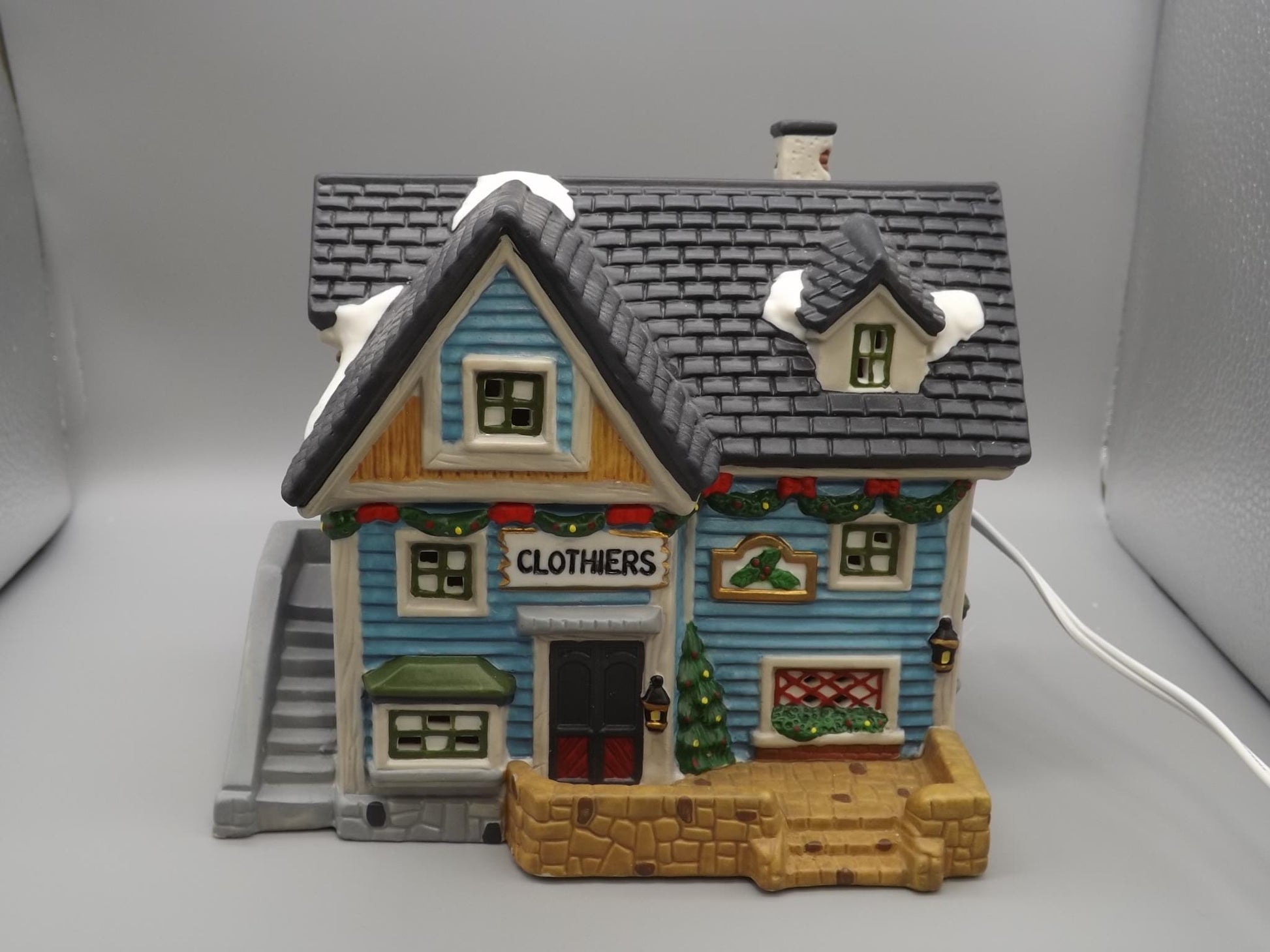 Vintage 1997 Dickens Keepsake Clothiers store Holliday display piece.