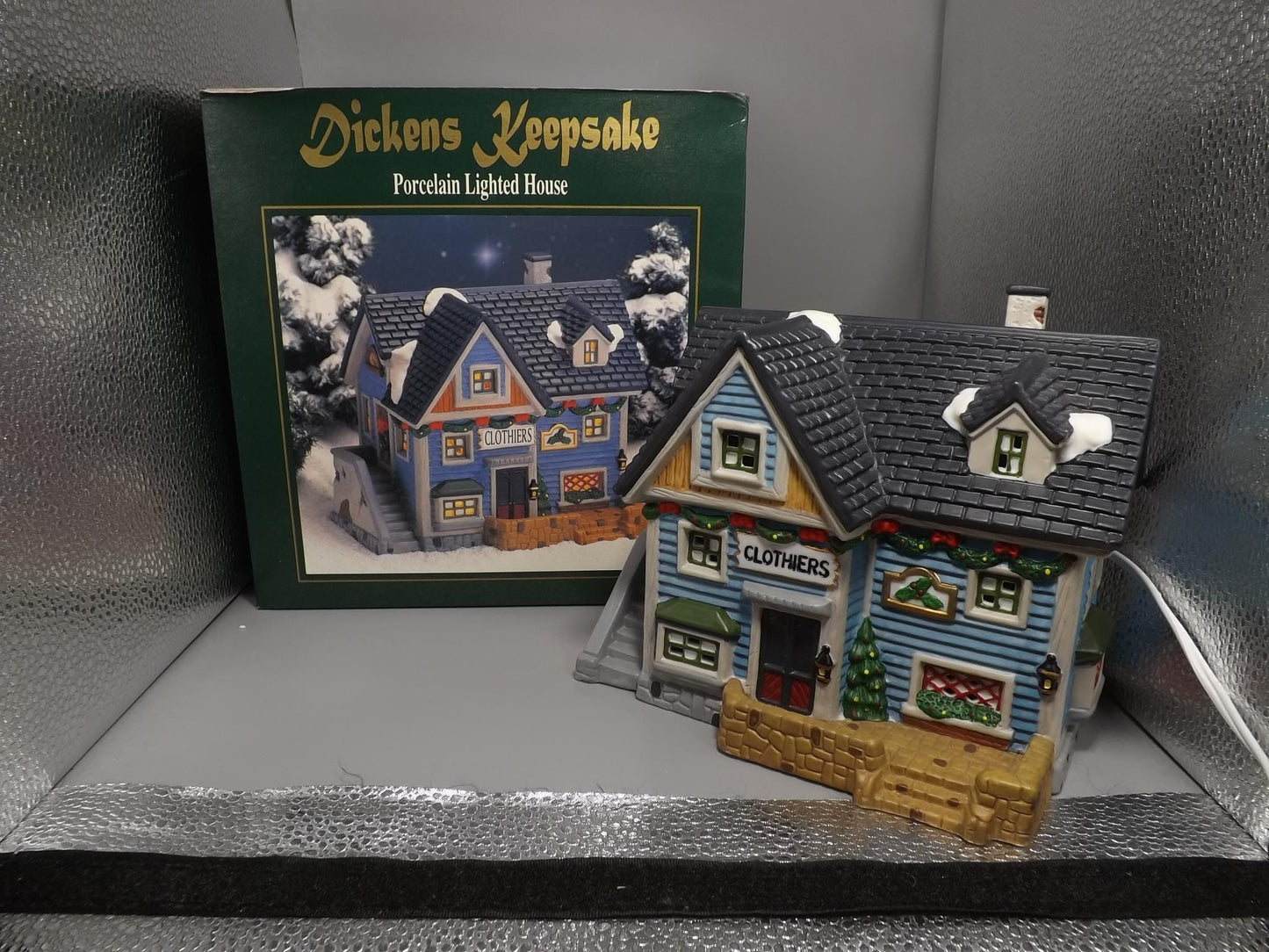 Vintage 1997 Dickens Keepsake Clothiers store Holliday display piece.