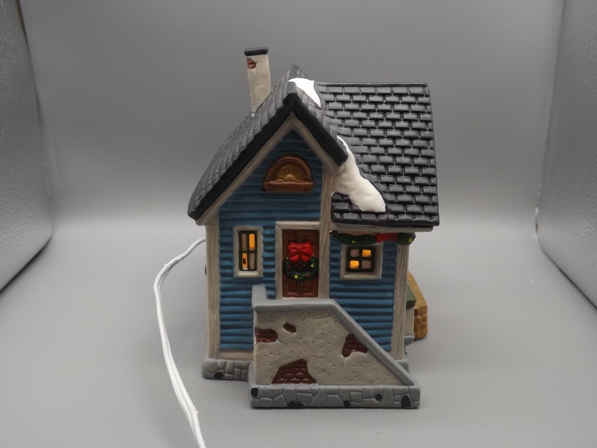 Vintage 1997 Dickens Keepsake Clothiers store Holliday display piece.