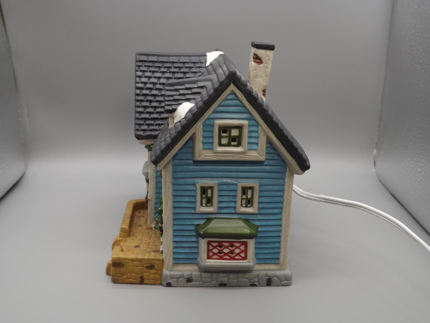 Vintage 1997 Dickens Keepsake Clothiers store Holliday display piece.