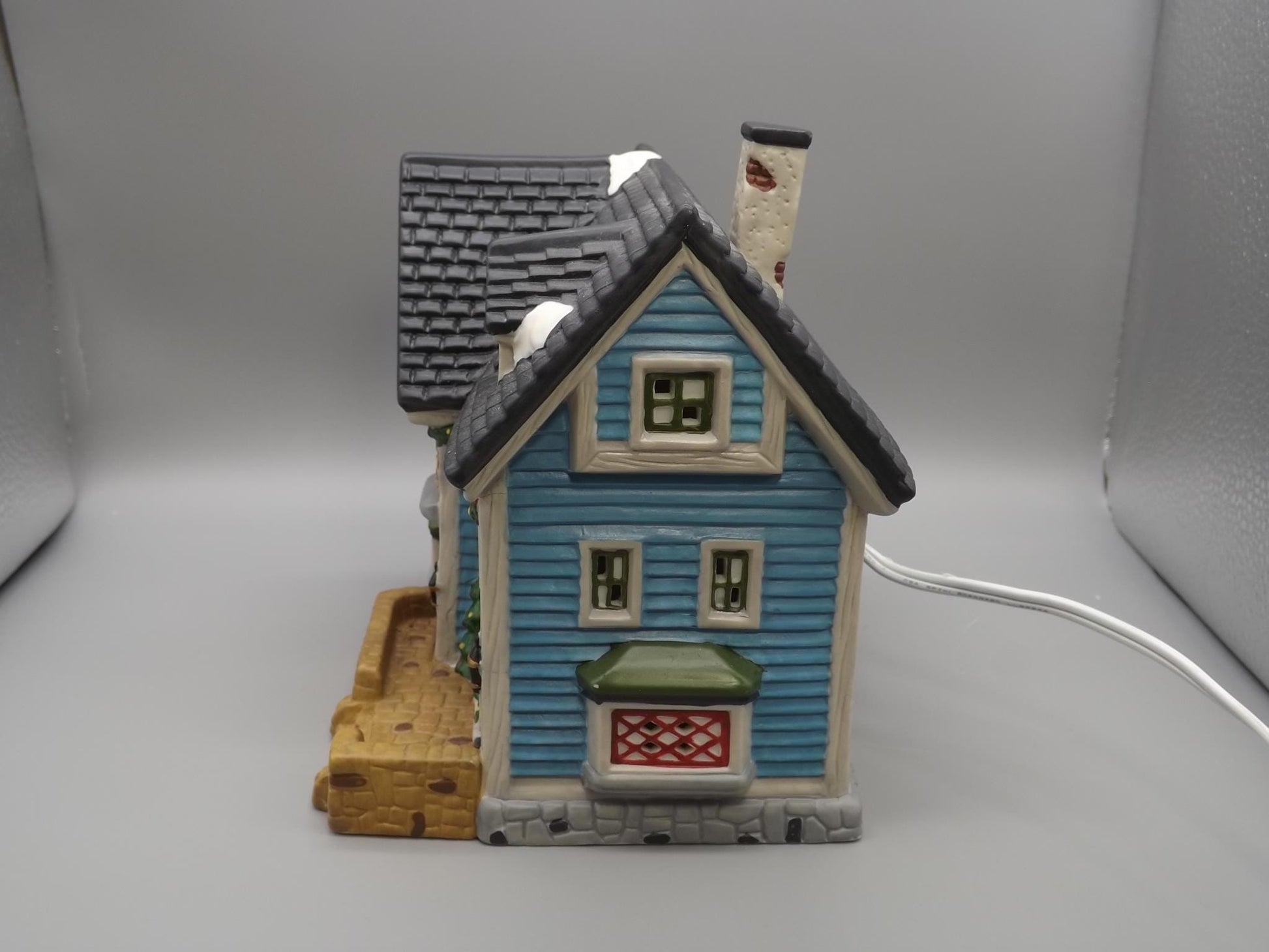 Vintage 1997 Dickens Keepsake Clothiers store Holliday display piece.