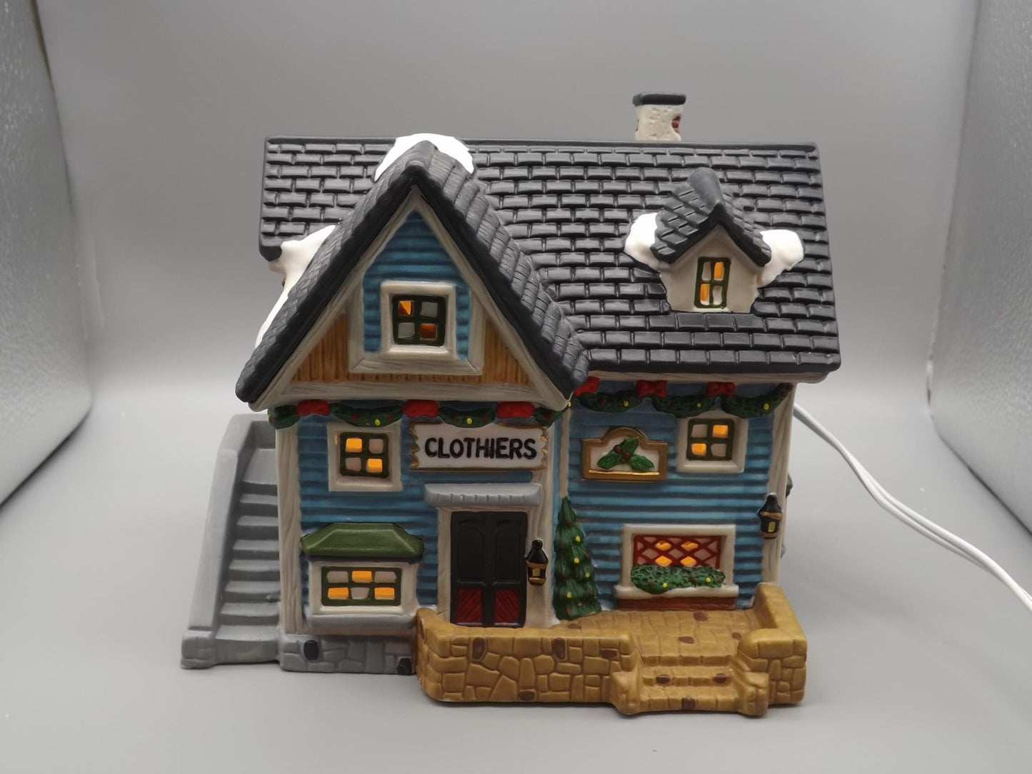 Vintage 1997 Dickens Keepsake Clothiers store Holliday display piece.