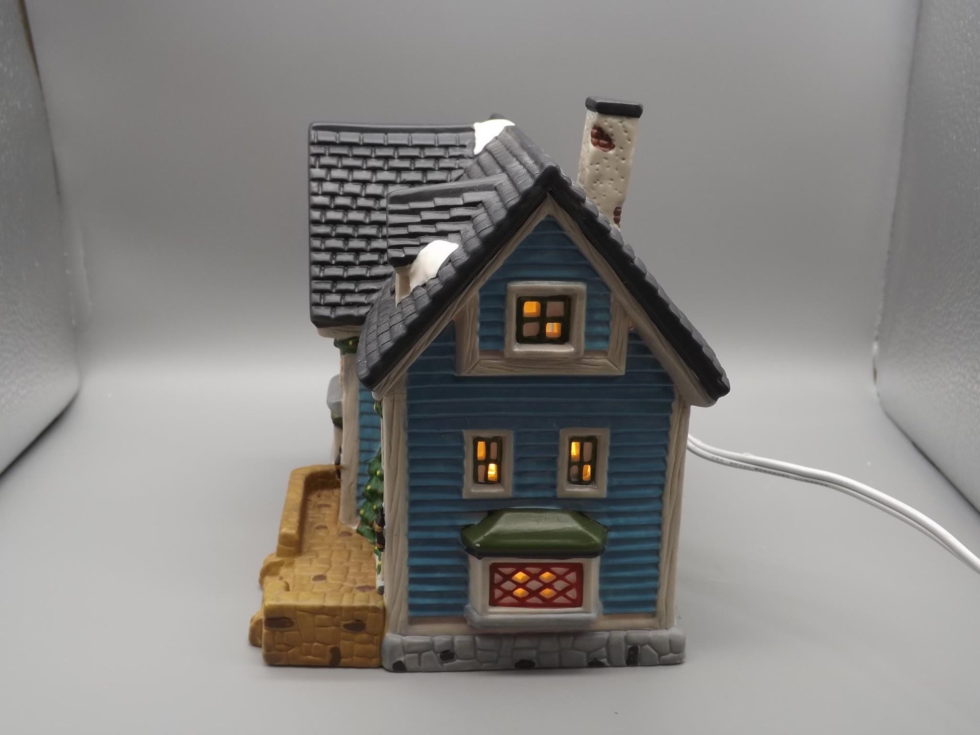 Vintage 1997 Dickens Keepsake Clothiers store Holliday display piece.